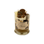 Cookies and cream candle with visible brand label on a white background