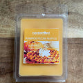 Packaged wax melt with Havenpoint branding on a wooden surface