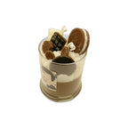 Glass container with dessert and cookies on a white background