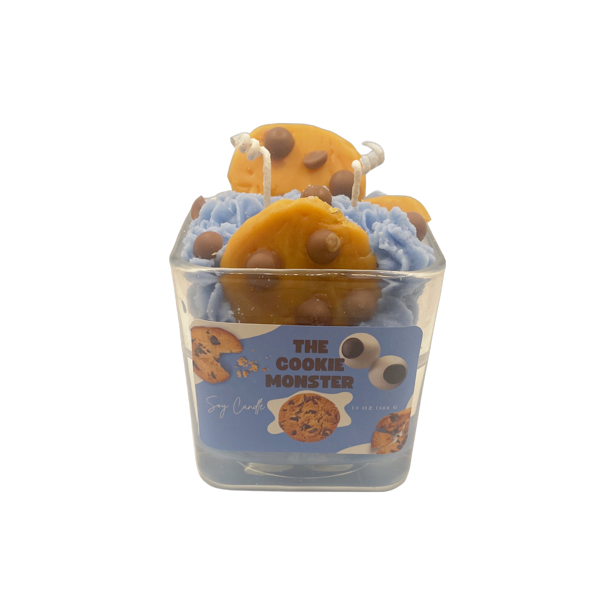 Candle with cookie design in a container labeled 'The Cookie Monster' on a white background
