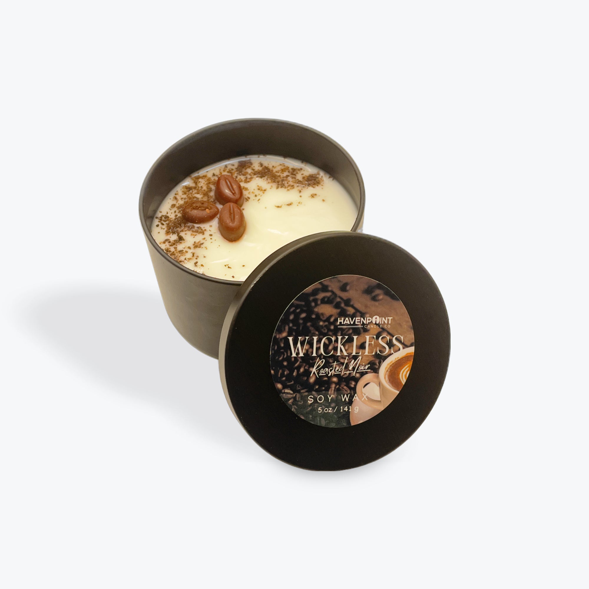 Wickless candle in a tin with a visible brand label on a white background