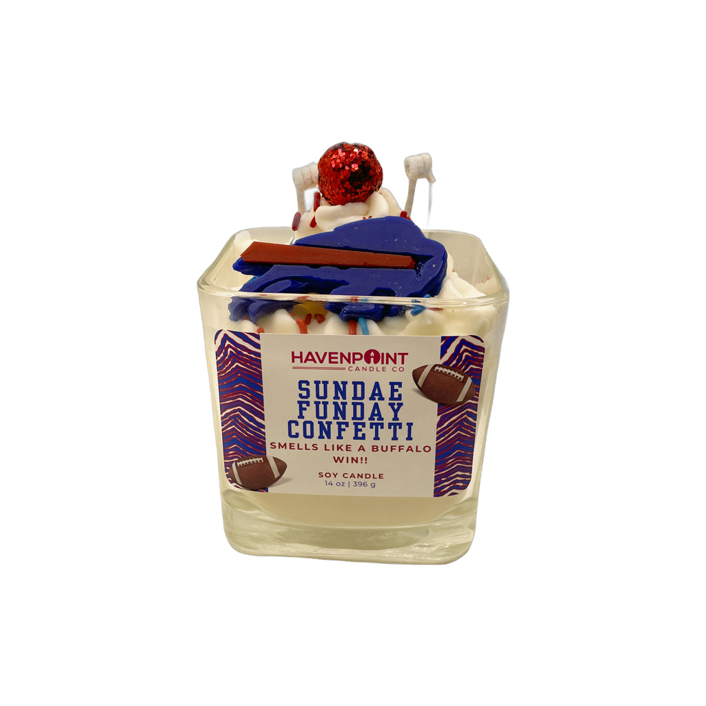 Candle with decorative elements and a label on a white background