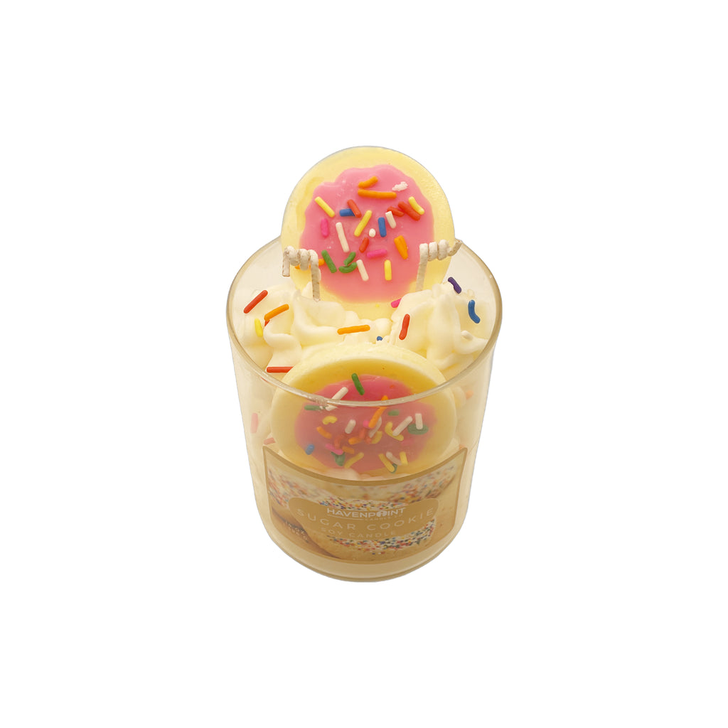 Scented candle with a donut design on a white background